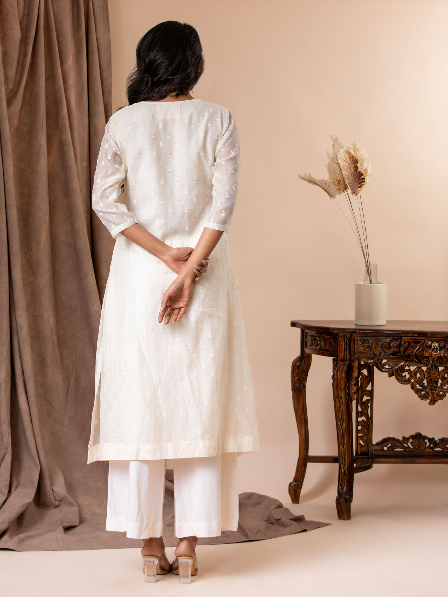 Ivory thread work Chanderi top with a Chanderi dupatta featuring all-over embroidery, paired with pants