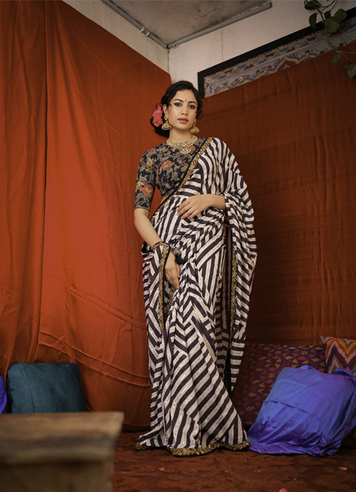 Make a Splash with Stylish Striped Saree and Printed Blouse