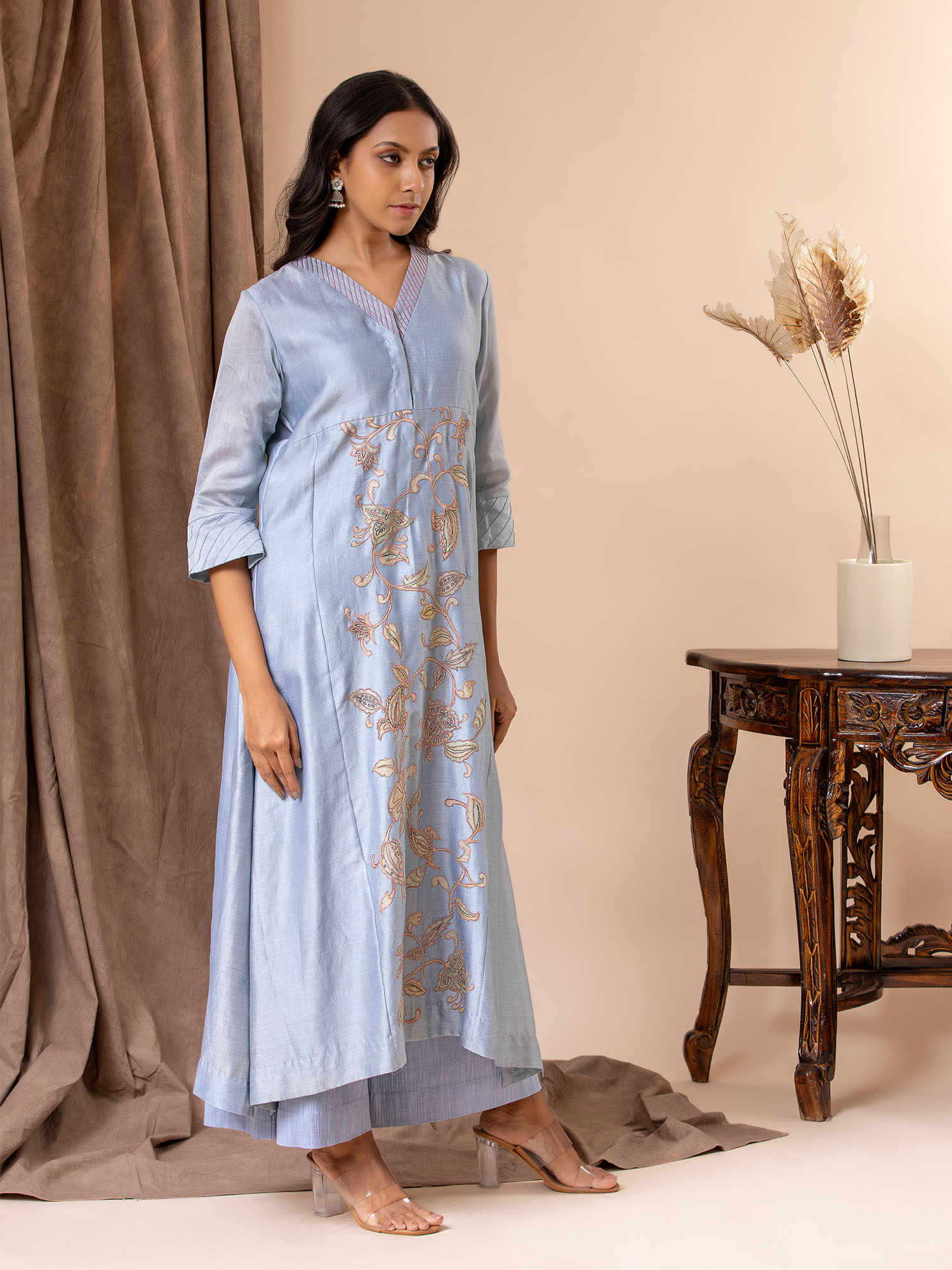 Powder blue Chanderi panel top featuring Kalamkari applique detailing, paired with matching pants